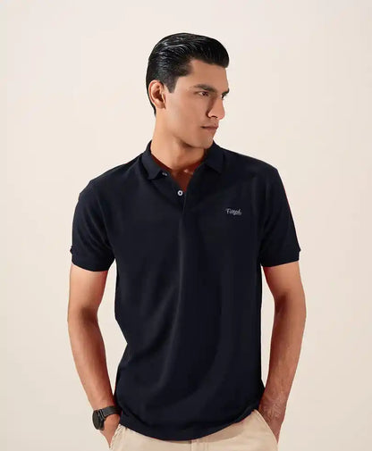 Navy fitted polo shirt, collared with button placket and chest logo