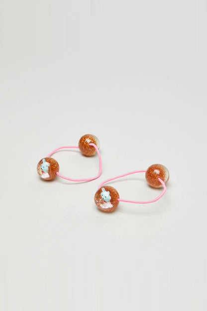 Kids glitter bead hair ties with pink elastic and three bunny-faced charms