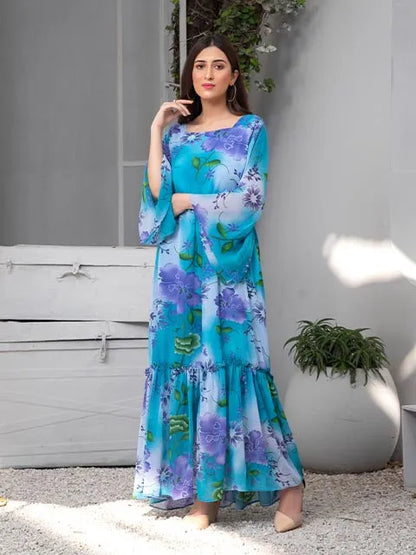 Nazmina turquoise floral maxi dress with purple flower print and tiered flowing skirt