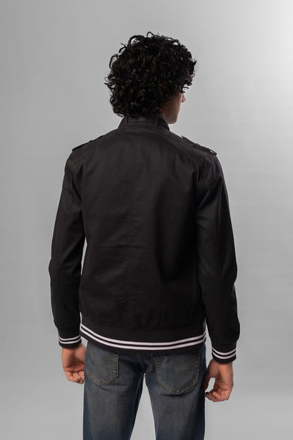 Back view of black Levi's jacket with ribbed trim at collar, cuffs, and hem