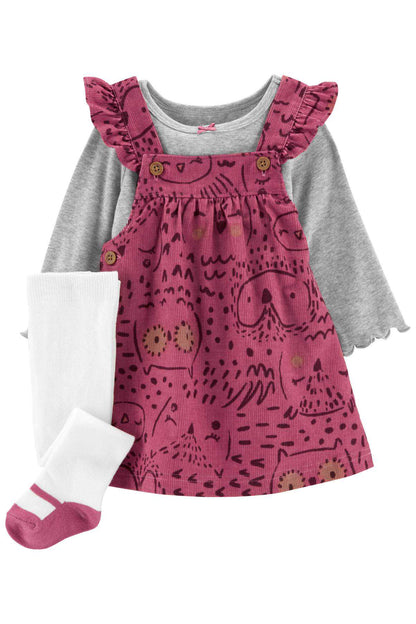 Girls' pink patterned pinafore dress over gray long-sleeve shirt, ruffled straps