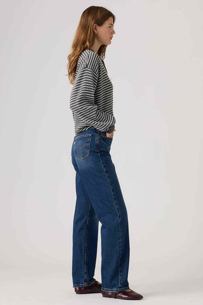 Dark indigo denim jeans with belt loops and visible side seam