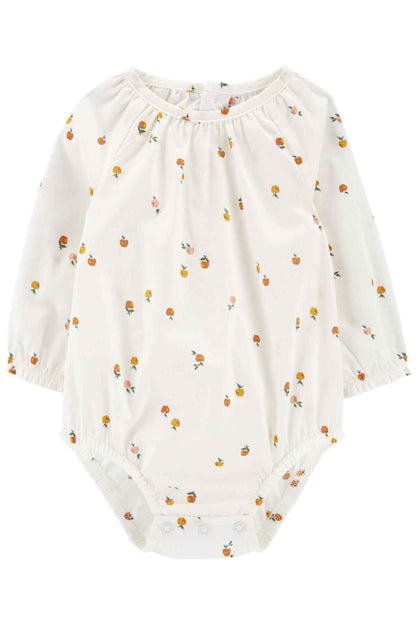 White long-sleeve bodysuit with allover fruit print and snap bottom