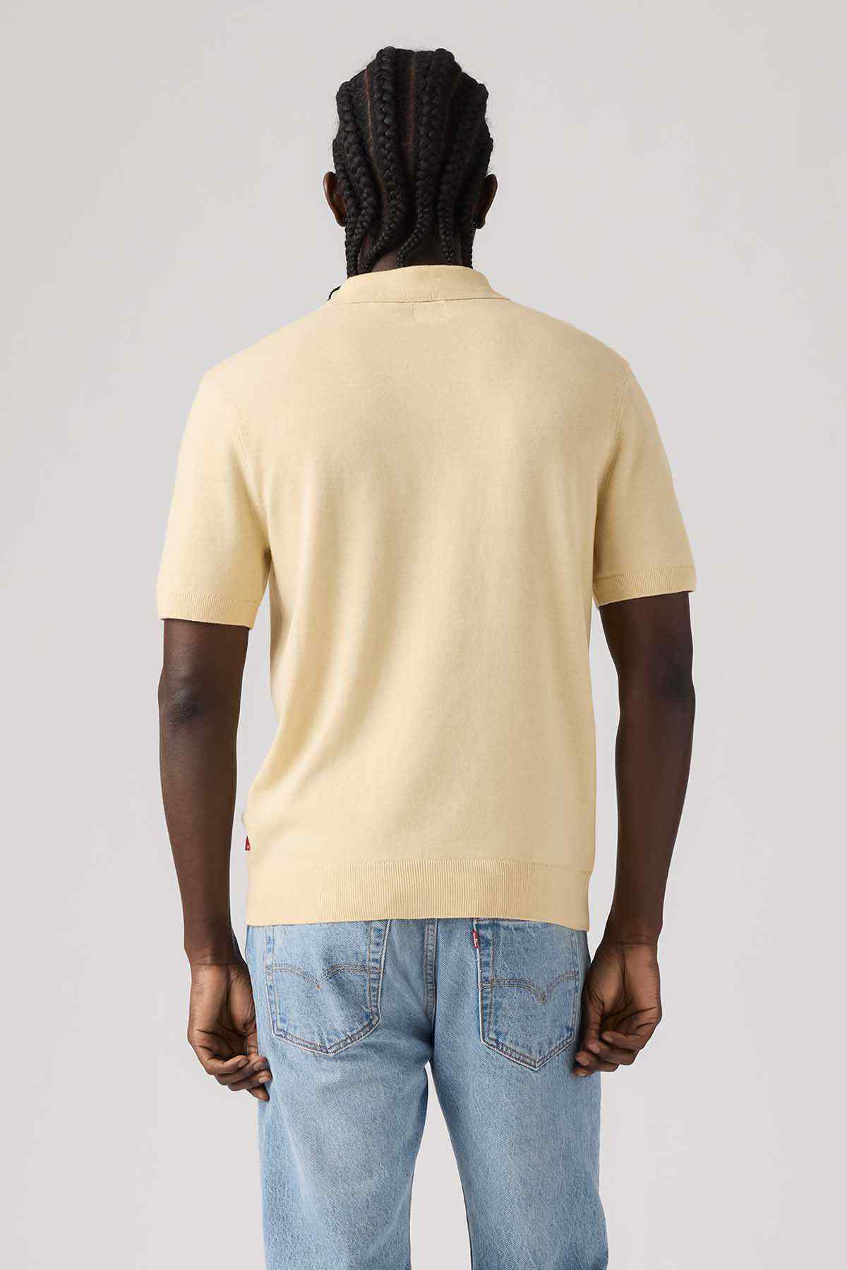 Levi's pale yellow polo sweater, back view, short sleeves, straight hem
