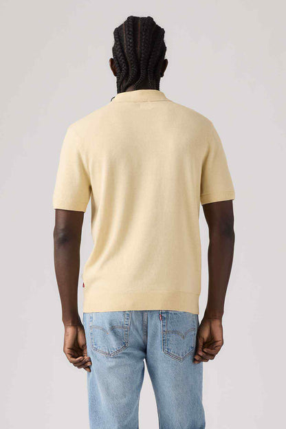 Levi's pale yellow polo sweater, back view, short sleeves, straight hem