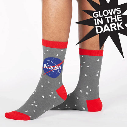 Pair of grey crew socks with red cuffs, white stars, NASA graphic and heel detail.
