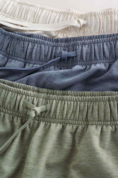 NEXT kids shorts close-up: elastic waist with drawstring tie and side seam