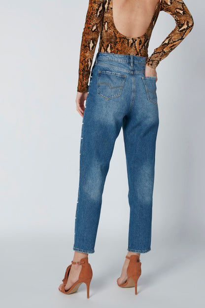 Blue distressed denim jeans with front pockets and ankle-length cuff