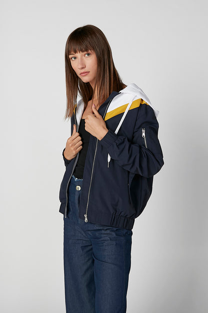 Dark navy hooded jacket with yellow/white stripe, front zipper, drawstring waist