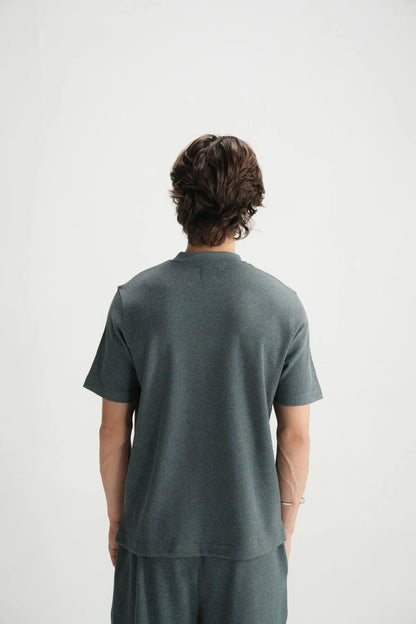Gray two-piece set with back of short-sleeve T-shirt and knee-length shorts