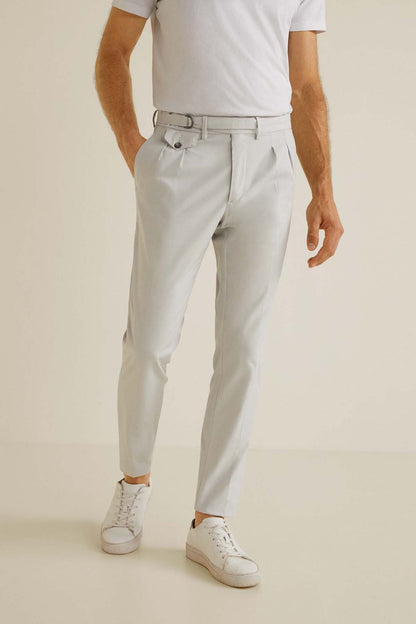 Beige men's tailored trousers with belt loops, button closure, and side pockets