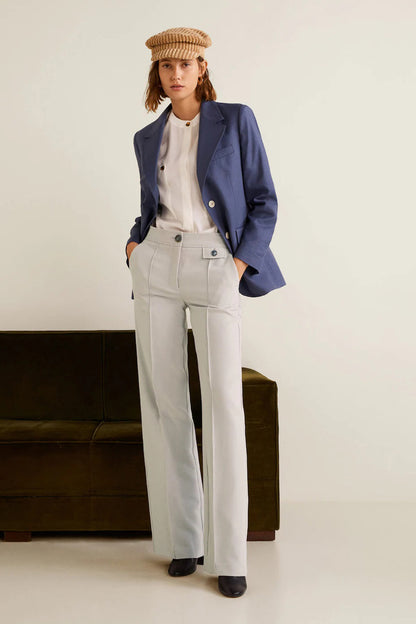 Light grey wide-leg trousers with center crease and front button closure