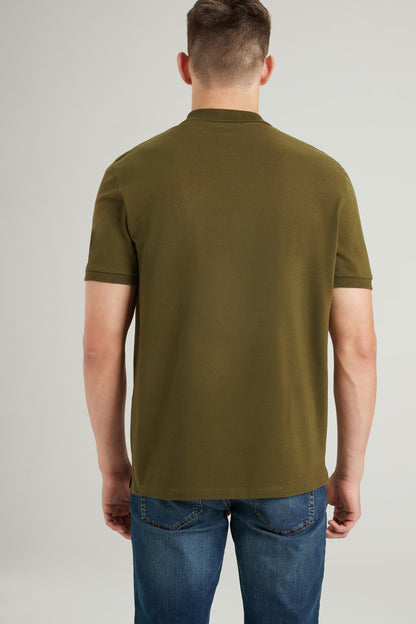 Khaki polo shirt back view with short sleeves and plain yoke