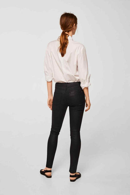 MANGO women's black slim jeans from back, mid-rise with stitched seams