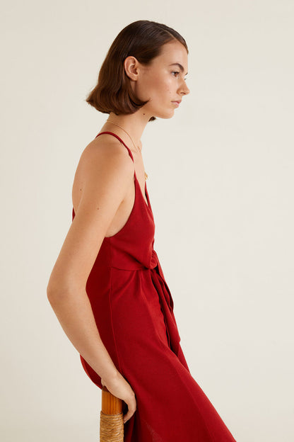 Maroon V-neck slip dress with spaghetti straps and tied waist detail