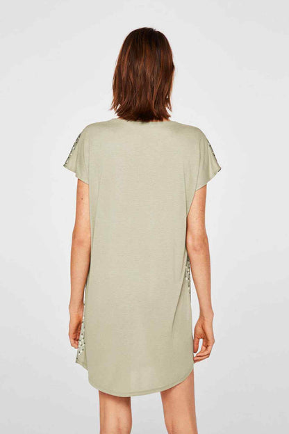 Mint green patterned V-neck mini dress with short sleeves, back view