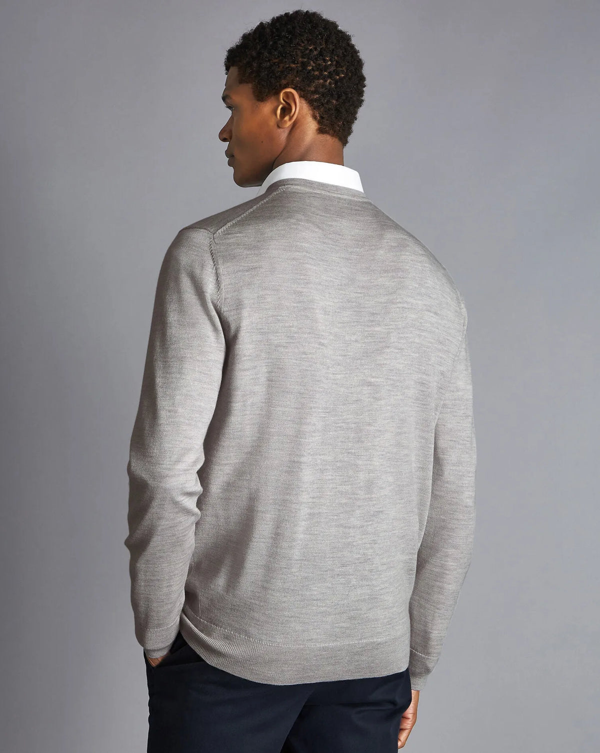 Men's grey V-neck knit sweater, back view, long sleeves
