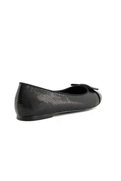 Black textured ballet flats with bow buckle strap and low block sole