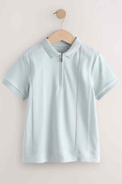 Light blue short-sleeve half-zip shirt with stand collar