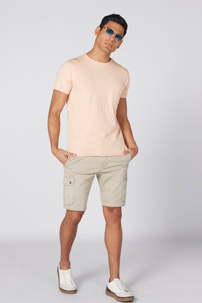 Men's light beige crew-neck T-shirt with chest pocket, short sleeves, side view