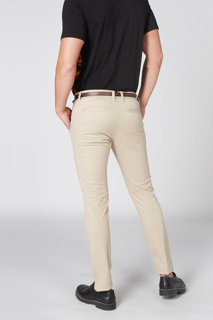 Men's plain black short-sleeve T-shirt with crew neck, worn with beige pants