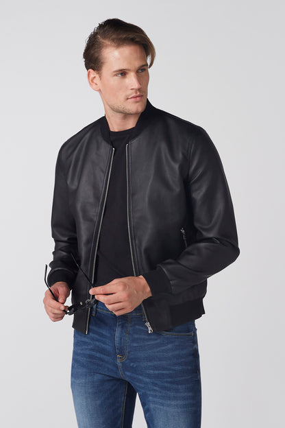 Men's black zip-up jacket, front 3/4 view with zipper pockets and ribbed cuffs