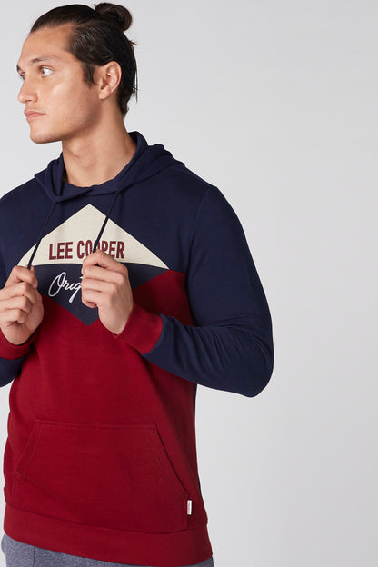 Navy and red colorblock hoodie with kangaroo pocket, hood, and front logo patch