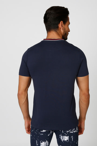 Men's navy short-sleeve T-shirt, back view; splash print swim shorts