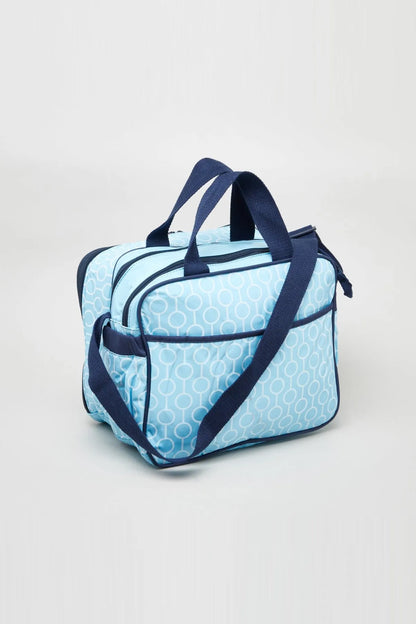 Blue patterned BABYSHOP duffel-style tote bag with zipper closure and shoulder strap