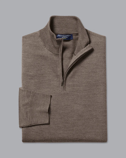 Men's brown quarter-zip sweater folded, mock neck and ribbed cuffs
