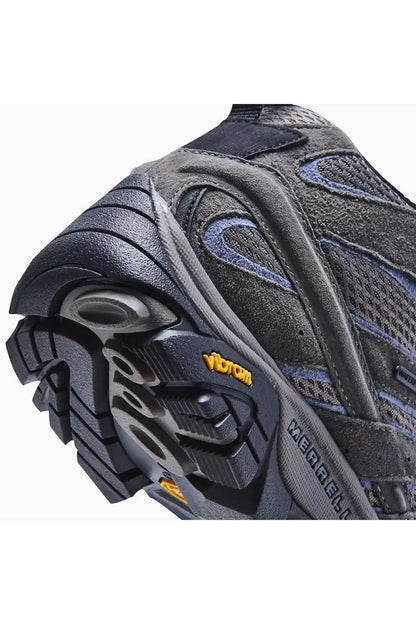 Merrell granite hiking shoe tread and branding, close-up of rubber outsole