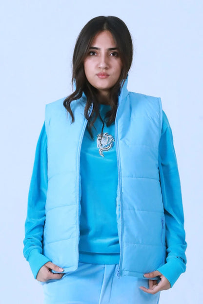 Blue quilted puffer vest with hood, front zip details and layered neckline