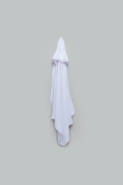 White hooded baby towel with draped corners and soft fabric