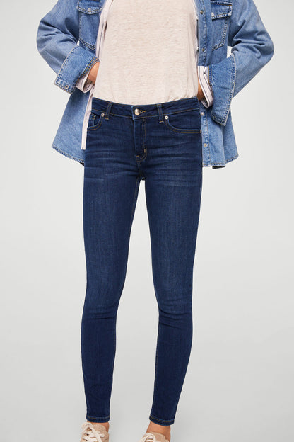 Dark blue denim skinny jeans with button fly, belt loops, ankle length