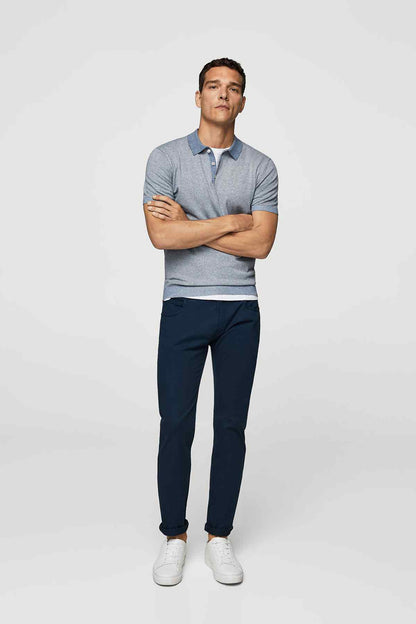 MANGO dark navy jeans on model, straight leg with ankle-length hem