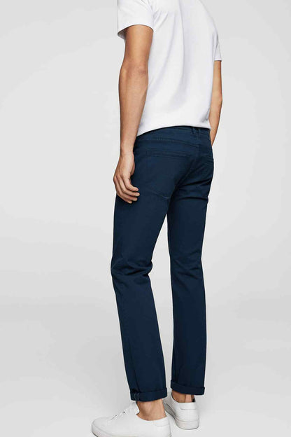 MANGO dark navy jeans with belt loops, stitched seams, and tapered leg