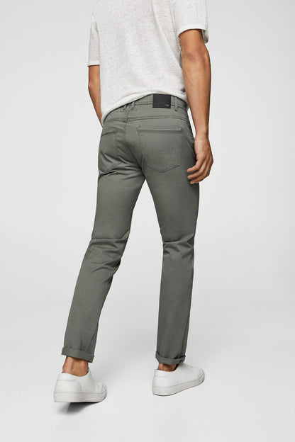 Grey slim-fit pants, side pockets and tapered leg