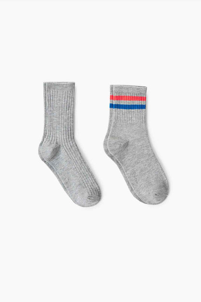 Grey ribbed crew socks with red and blue striped cuff