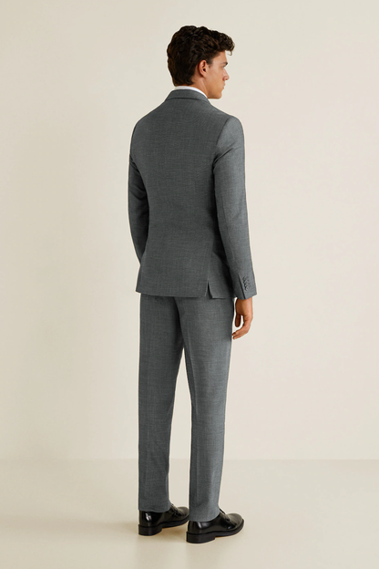 Medium grey suit trousers and blazer, side/back view with matching jacket fit