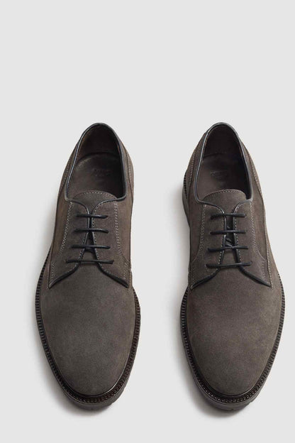 Pair of dark grey suede lace-up oxford shoes with black laces