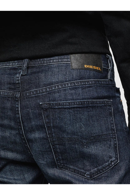 Diesel dark blue denim jeans with back yoke stitching and logo patch at waistband