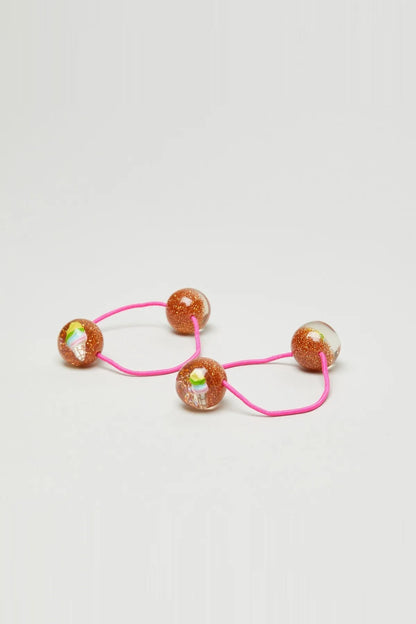 Glitter bead hair ties with pink elastic and two round sparkle beads