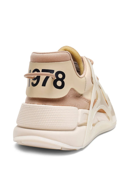 Cream sneakers with tan heel panel and large '78' label on the back