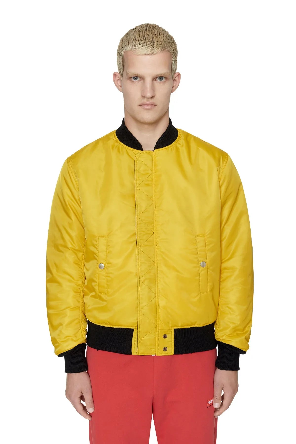 Diesel yellow bomber jacket with full-zip front, ribbed cuffs, side pockets.