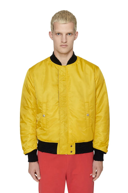 Diesel yellow bomber jacket with full-zip front, ribbed cuffs, side pockets.