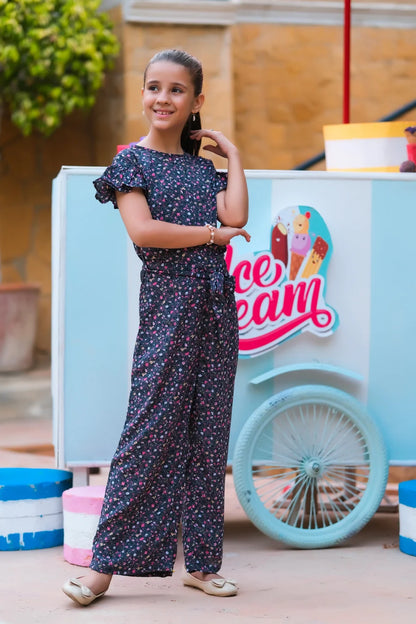 Girls' dark floral jumpsuit with round neckline and ruffled short sleeves