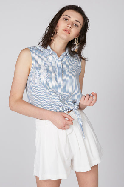 Sleeveless blue striped button-up blouse with pointed collar and tied waist