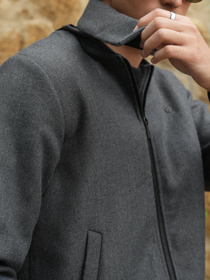 Grey textured zip jacket with mock collar and zip pull detail