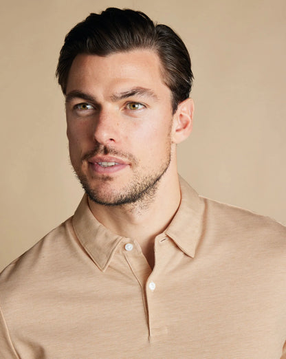 Charles Tyrwhitt polo shirt, light tan short sleeves with buttoned collar
