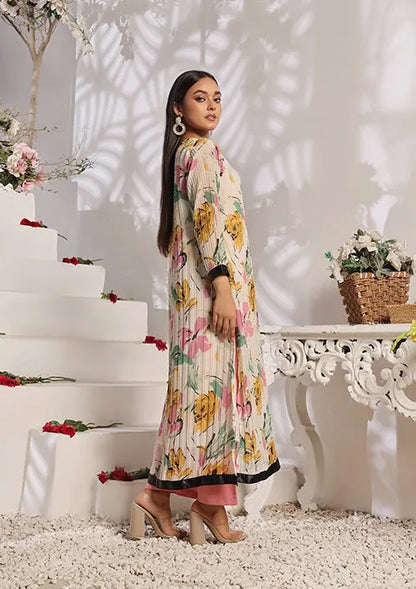 Nazmina floral print maxi dress front view, pleated texture with maroon hem trim